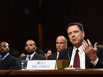 Former FBI Director James Come...